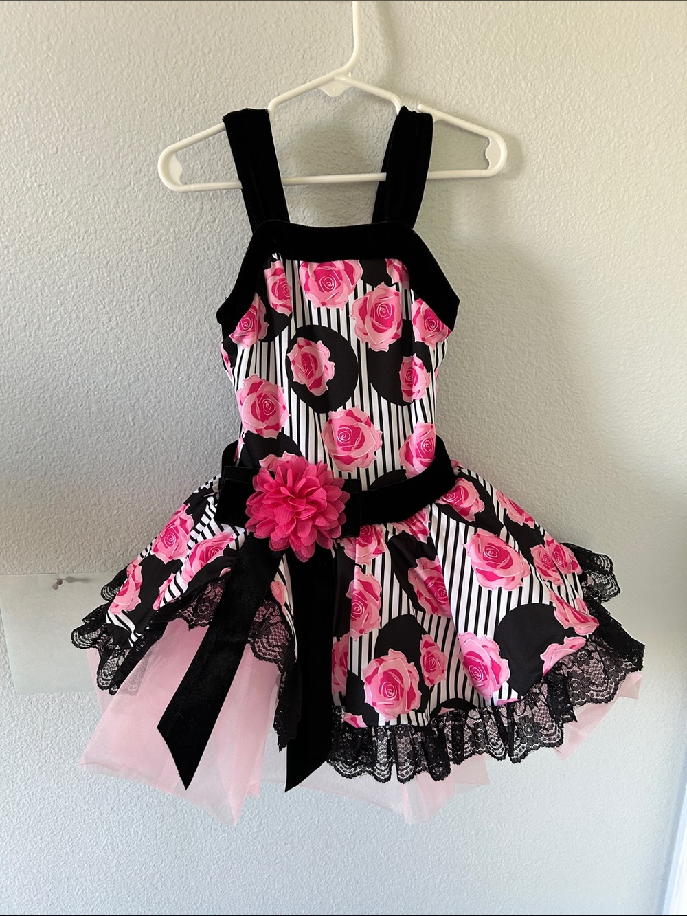 Revolution dance style RC 20525 size SC pink and black rose print tutu. NWOT.